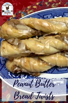 three pieces of bread on a blue and white plate with the words peanut butter bread twists