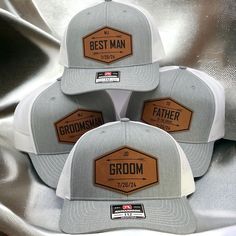 three hats with the words best man and groom written on them, all in grey and white