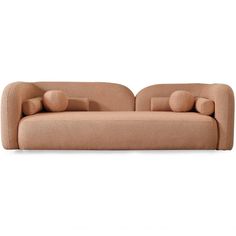 a beige couch with pillows on the back and armrests, in front of a white background