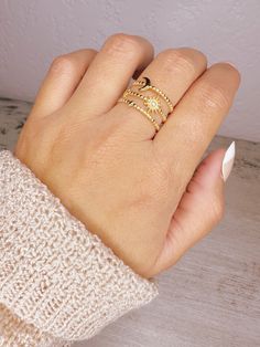 Crafted with 18k PVD plating, our Esme Ring is designed to be tarnish-free and hypoallergenic, making it perfect for everyday wear. Its dainty style features sun and moon designs, and is easily adjustable for a comfortable fit. Experience the beauty and versatility of the Esme Ring. Moon Designs, Dainty Style, Moon Design, Sun And Moon, The Beauty, Everyday Wear, Comfort Fit, Plating, Moon