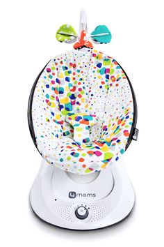 a baby swing that is in the shape of a ball with multicolored dots on it