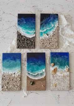 four pictures are placed next to each other on the sand near the water and rocks