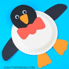 a paper plate with a penguin on it