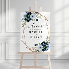 an easel with a sign that says welcome to the bride and groom