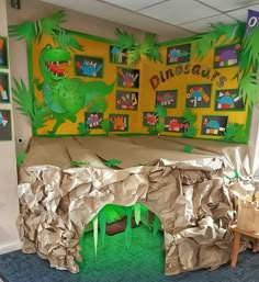 the room is decorated with dinosaur themed decorations