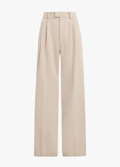 The Low Favorite Pant is our best-selling mid-rise trouser (formerly The Agnes Pant), cast in a structured Italian suiting fabric. With a fluid wide-leg silhouette and front pleats, these classic ivory pants are a true wardrobe essential.Inseam: 34"Rise: 11 3/4" 63% Polyester, 32% Rayon, 5% Spandex Adrianna is 5'9" wearing size 2 Video: Misia is 5' 10" wearing a size 14 Lauren is 5’10” a size 6 Wide Leg Trousers Outfit, Ivory Pants, Celana Fashion, Cream Trousers, Work Pants Women, Trouser Outfit, Cream Pants, Suiting Fabric, Beige Pants