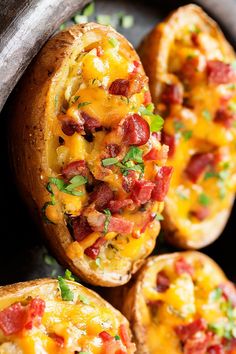 baked potatoes with bacon and cheese on them