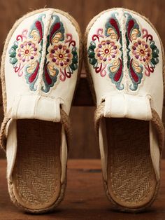 Slip into sophisticated style with these embroidered shoes boasting an on-trend mule silhouette for effortlessly chic steps. Slip-on Canvas linen upper Man-made lining Natural straw mat insole Rubber sole Ethnic Trends, Embroidered Slippers, Embroidered Flats, Woven Shoes, Black Slippers, Embroidered Shoes, Summer Slippers, Floral Shoes, Pattern Flower