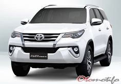 the front view of a white toyota suv