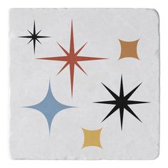 four star shapes are shown on a white background with black, red, yellow and blue colors