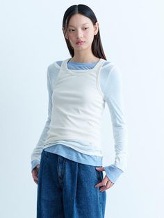 This is a modern and refined t-shirt by kuho plus that is made out of high quality and sturdy material. With distinctive mood of the design and comfortable wear, you can style it for your modern daily outfit.- Unique layered design detail- Sheer boatneck long sleeve - Sturdy ribbed sleeveless top Long Sleeve Shirt Layering Outfit, Modern White Tops For Layering, Layered Tops Outfits Long Sleeve, Long Sleeve With Tshirt Over Outfit, Tshirt Layering Outfit, Layered Tshirt Outfits, Shirt Layering Outfit, Outfits Unique, Sheer Shirt