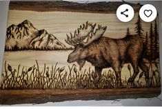 a moose is standing in the grass by some trees and mountains with hearts on it