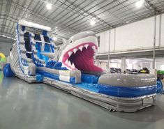 an inflatable boat with a shark on it