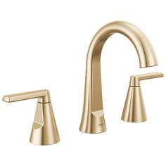 a gold faucet with two handles