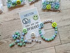 some green and blue beads with smiley faces on them