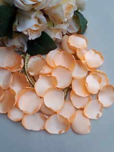 some flowers that are laying on a table