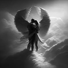 two people standing in the clouds with their arms around each other as they hug and kiss