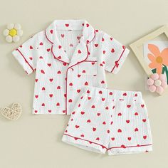 Fall in love with our HEARTS Muslin Pyjamas for baby girls! Featuring a playful hearts pattern, these pyjamas are perfect for Valentine's Day, or keeping cool and comfortable in the summer. Designed for your little sweetheart, these pyjamas are a must-have! Cute Printed Cotton Sleepwear, Playful Printed Cotton Sleepwear, Sweet Cotton Sleepwear For Sleepover, Cotton Sleepover Sets For Summer, White Cotton Pajama Party Sets, Cute Cotton Sleepwear With Cartoon Print, Cartoon Print Cotton Sleepwear For Summer, Cute Printed Loungewear Sets, White Matching Sets For Summer