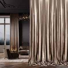 a living room filled with furniture and a large window covered in gold drapes next to a chandelier