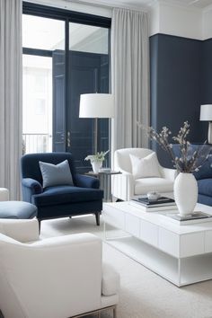 a living room with blue and white furniture