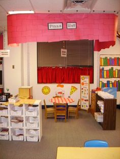 a classroom with desks, chairs and other items