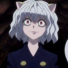 an anime character with white hair and blue eyes wearing a cat ears outfit in front of a cave