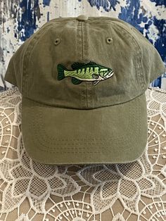 High quality embroidered baseball cap with a fish on it, buy this hat fast as it is the only one like it in the shop for the fisherman in your life. You get to pick the hat color on this listing to make it a custom hat. Please follow us on Facebook for up coming new items and coupon codes that we run a couple times a year. Cheap Embroidered Baseball Cap Trucker Hat, Outdoor Embroidered Trucker Baseball Cap, Embroidered Baseball Cap For Beach, Green Embroidered Snapback Baseball Cap, Green Fishing Cap, Embroidered Fish, Fish Hat, Green Embroidered 5-panel Baseball Cap, Sweatshirt Blanket