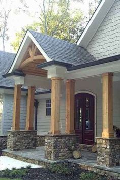 a house that has columns on the front porch