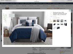 an image of a bed with blue and white comforter set on the web page