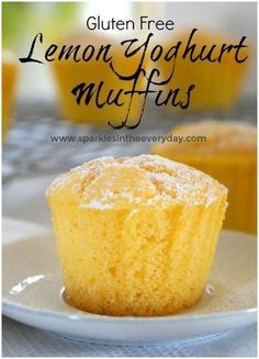 a close up of a muffin on a plate with the words gluten free lemon gourmet muffins