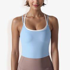 The Anna-Kaci Women's Double Strap Athletic Crop Tank Top with Built-In Bra is a stylish and practical addition to your activewear collection. This crop top features a sleek, double strap design that provides both support and a modern, sporty look. The built-in bra ensures added comfort and convenience, making it perfect for low to medium-impact workouts like yoga, Pilates, or strength training. Crafted from soft, stretchy fabric, this tank top offers a snug, flattering fit that moves with you d