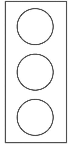 a traffic light is shown with two circles on the front and one circle on the back