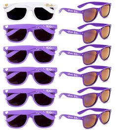 six pairs of sunglasses with purple frames and hearts on the sides, all in different colors