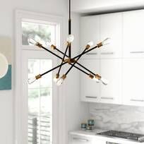 a chandelier hanging from the ceiling in a kitchen