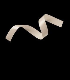 a white ribbon on a black background