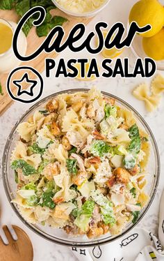 a pasta salad with chicken, lettuce and cheese