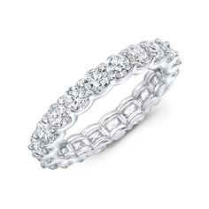 a white gold ring with rows of diamonds