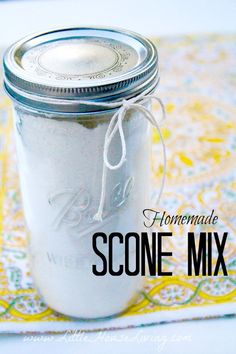 there is a mason jar with some white stuff in it and the words homemade scone mix