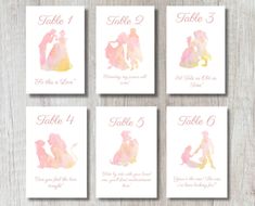 wedding table numbers with watercolor princess silhouettes on white paper and pink inking