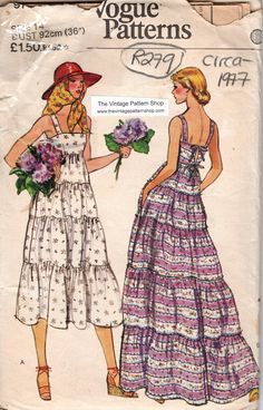 two women in dresses and hats, one is holding flowers