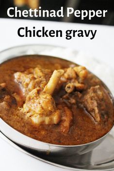 chicken gravy in a metal bowl on a white table with text overlay