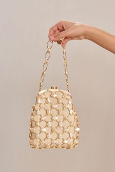 A caged pearl and lambskin evening bag with top closure. — Gold toned rings with pearl accents — Lambskin body — Top closure Cult Gaia Bag, Bridal Tops, Wristlet Bag, Bamboo Bag, Pearl Bag, Sandal Platform, Evening Sandals, Body Top, Swimming Bag