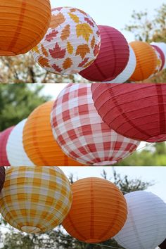 many paper lanterns are hanging in the air