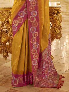 Step into the realm of timeless elegance with this stunning banarasi silk saree, draped in a radiant shade of yellow that exudes vibrancy and charm. Designed to captivate, this saree effortlessly combines traditional craftsmanship with contemporary style, making it an ideal choice for weddings, festivals, and any special occasion. The intricate zari weaving work intricately adorns the fabric, adding a touch of opulence and sophistication to every fold.
With a generous length of 5.50 meters, this Yellow Handloom Pre-draped Saree For Wedding, Festive Yellow Paithani Silk Pre-draped Saree, Traditional Yellow Pre-draped Saree With Self Design, Yellow Traditional Wear With Patterns For Eid, Yellow Paithani Silk Anarkali Pre-draped Saree, Traditional Yellow Paithani Silk Pre-draped Saree, Yellow Semi-stitched Handloom Saree, Traditional Yellow Semi-stitched Saree, Yellow Traditional Handloom Pre-draped Saree