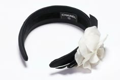 Chanel Camellia Bow Flower Headband. Limited Edition 1990’s CHANEL Paris black satin headband with Camellia flower in very good condition, with slight wear on the satin and flower. Collectors item! One size fits all. Made in France. Chanel Headpiece, Chanel Accessories Hair, Camelia Chanel, Cartier Love Wedding Band, Elegant Long Sleeve Wedding Dresses, Black And White Chanel Jewelry, Chanel Camellia Brooch