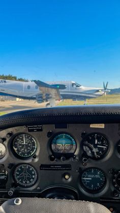 an airplane cockpit with several gauges and instruments