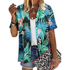 The NFTOEIULA Hawaiian Floral Print Oversized T-shirt is the epitome of summer fashion. This eye-catching piece captures the essence of Hawaiian style with its vibrant floral pattern and offers an oversized fit for ultimate comfort. The soft, cool, and breathable chiffon fabric makes it an ideal choice for the warmer months, ensuring you stay comfortable while looking effortlessly chic. Designed to be versatile, the shirt allows for multiple styles of wear, making it a must-have addition to any Summer V-neck Shirt For Vacation, V-neck Shirt For Summer Vacation, Oversized Summer T-shirt, Printed V-neck Hawaiian Shirt For Summer, Summer Casual Blouse With Graphic Print, Casual Summer Blouse With Graphic Print, Trendy Printed Hawaiian Shirt For Spring, Summer Graphic Print Short Sleeve Blouse, Summer Graphic Print Blouse With Short Sleeves