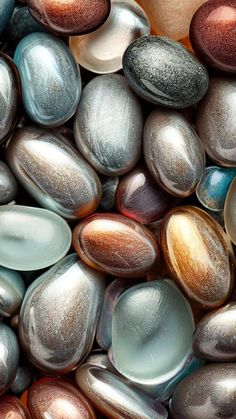 many different colored rocks and pebbles together