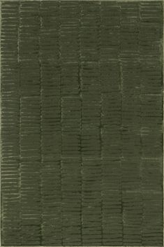 an area rug that is made out of dark green material with small squares on it