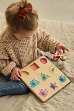 Playing with this Montessori wooden shape puzzle the child will easily learn colors and geometric shapes. The toy will also help in the development of fine motor fingers, coordination of hand movements. Wooden Shape Puzzle, Shape Puzzle, Hand Movements, Wooden Educational Toys, Baby Puzzles, Handmade Baby Toys, Educational Toys For Toddlers, Learn Colors, Shape Puzzles